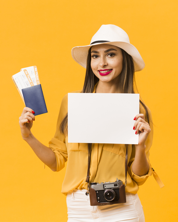 woman-carrying-camera-holding-plane-tickets-passport